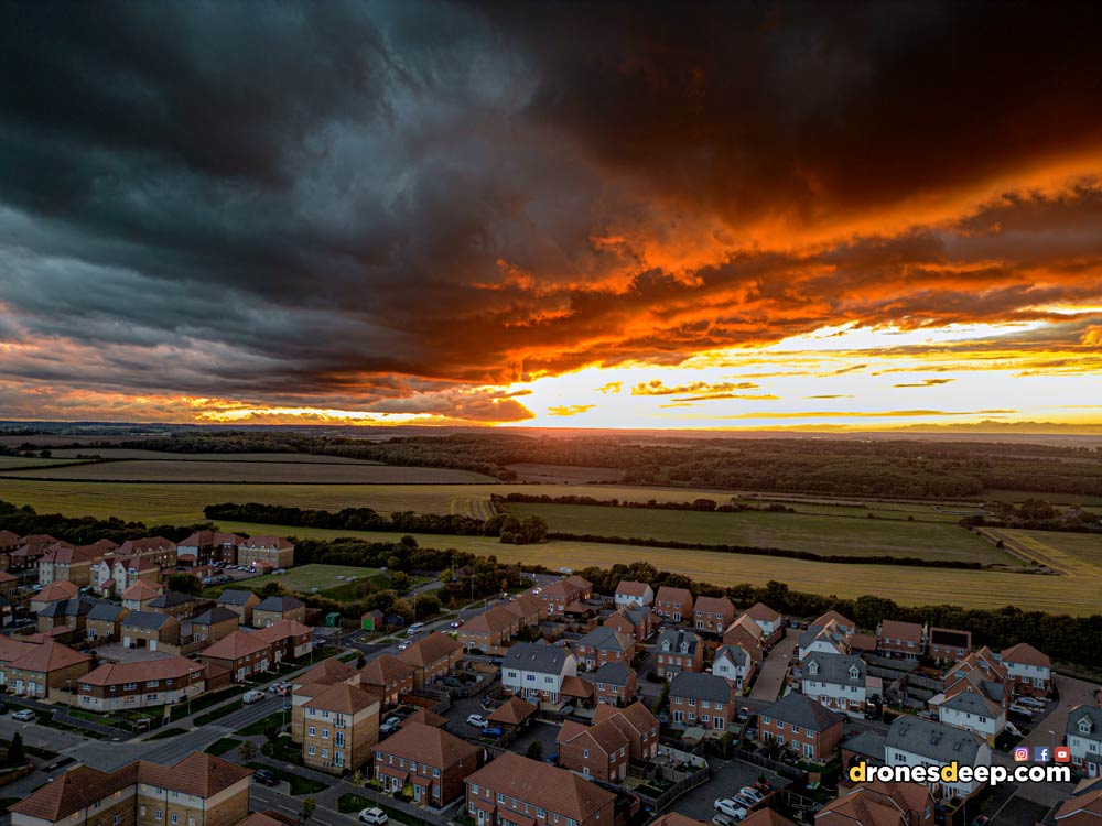 Aylesham sun set with dark clouds